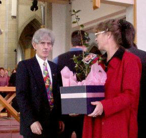 John and Susan receive the gift of a Camellia.