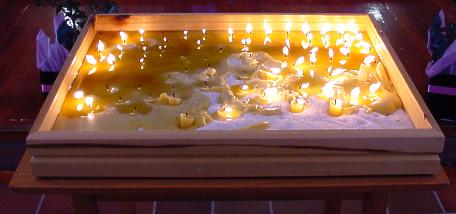 Candles lit by recipients of organs, after the service.